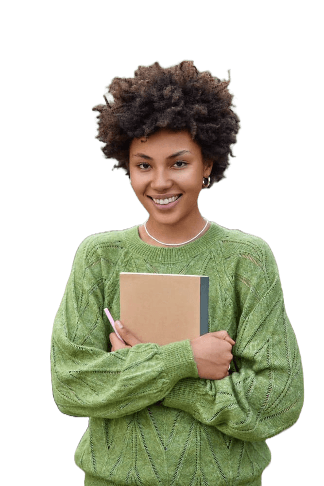 female student holding a book and smiling